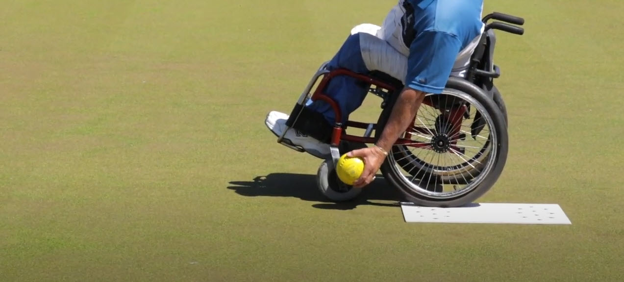 Wheelchair lawn bowls with Snow 31 New Zealand Spinal Trust